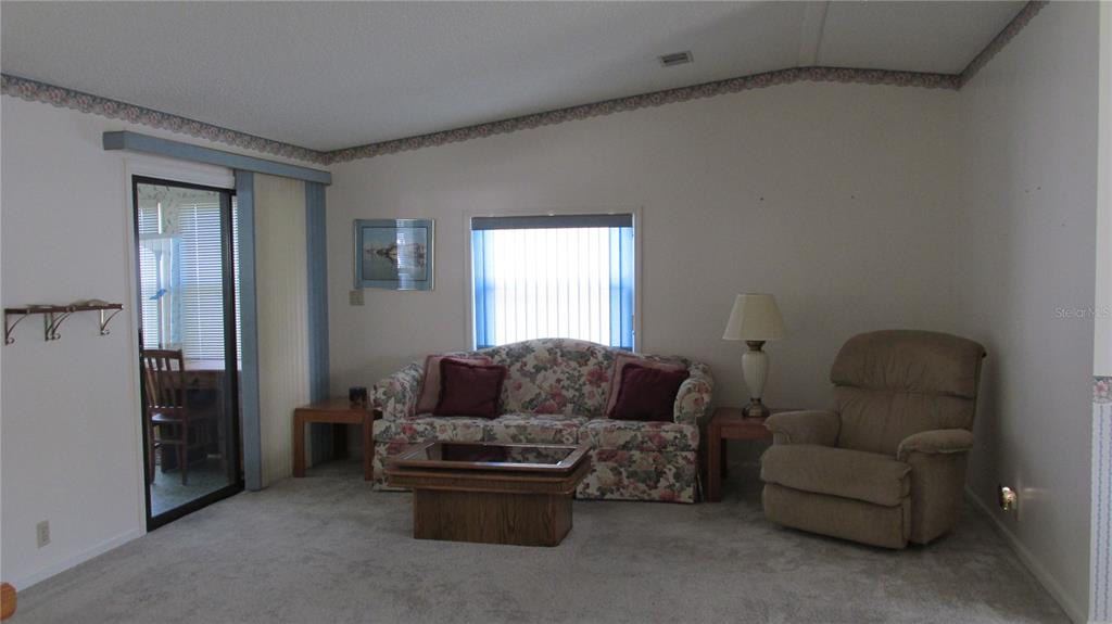 253 Ramsgate Way Haines City, FL 33844 - Photo 5 of 21 a living room with furniture and a window