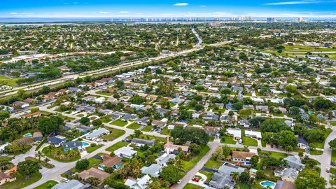 a view of city and green space