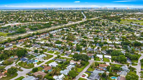 a view of city and green space