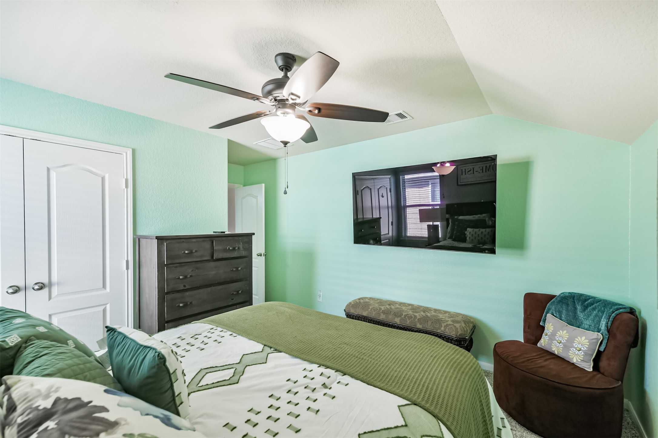 24047 Schults Meadow Lane Spring, TX 77389 - Photo 40 of 47 a bedroom with a bed window and couch