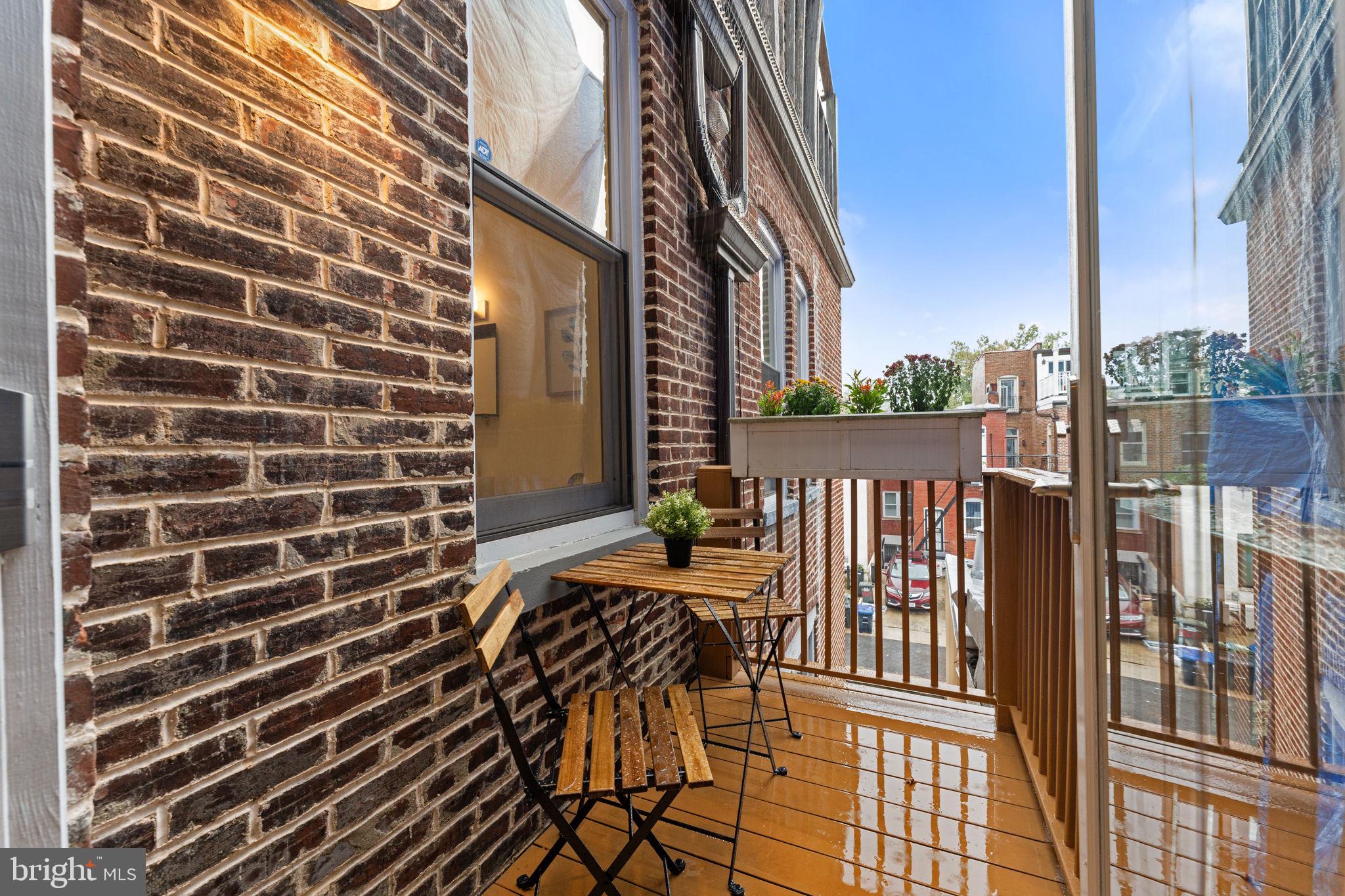 1516 R Street Northwest, Unit 3 Washington, DC 20009 - Photo 24 of 28 a view of a balcony with chairs