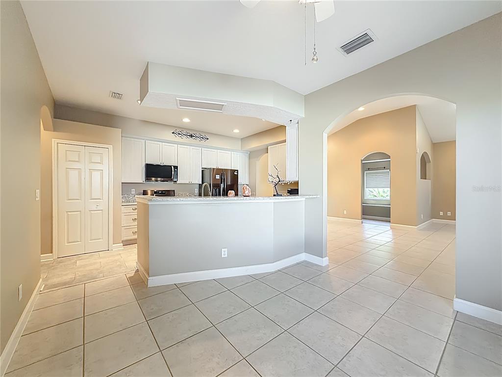 5510 Celebration Way Leesburg, FL 34748 - Photo 12 of 62 a view of a kitchen with electric appliances