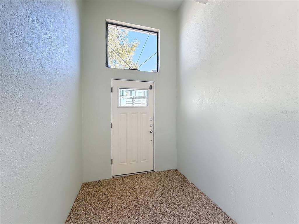 5510 Celebration Way Leesburg, FL 34748 - Photo 2 of 62 a view of an empty room with window