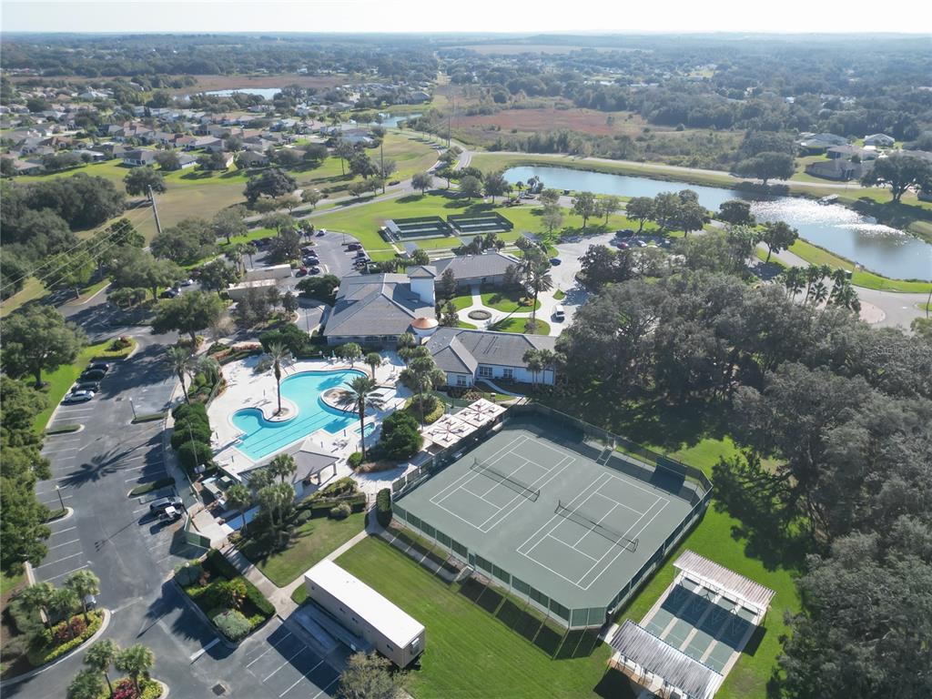 5510 Celebration Way Leesburg, FL 34748 - Photo 58 of 62 an aerial view of residential houses with outdoor space