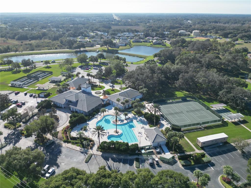 5510 Celebration Way Leesburg, FL 34748 - Photo 59 of 62 an aerial view of residential houses with outdoor space and river