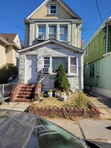 a front view of a house with porch
