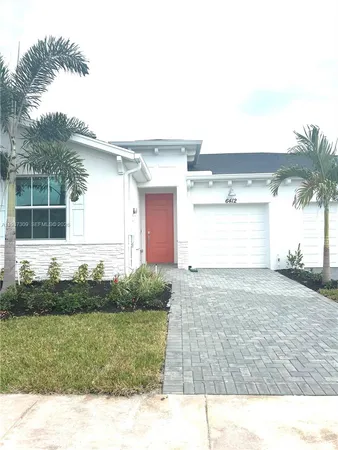 a black and white photo of a house