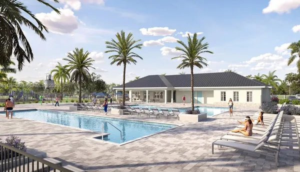 a view of a yard with an outdoor seating