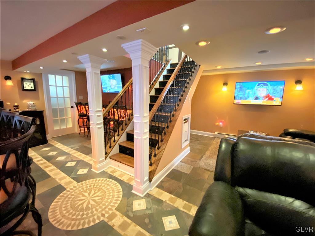 314 Willow Road Hellertown, PA 18055 - Photo 16 of 31 a living room with furniture and a flat screen tv