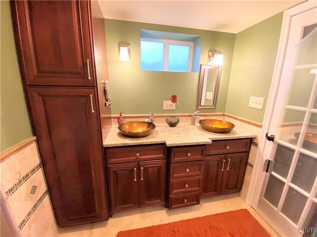 314 Willow Road Hellertown, PA 18055 - Photo 24 of 31 a bathroom with a sink and a mirror