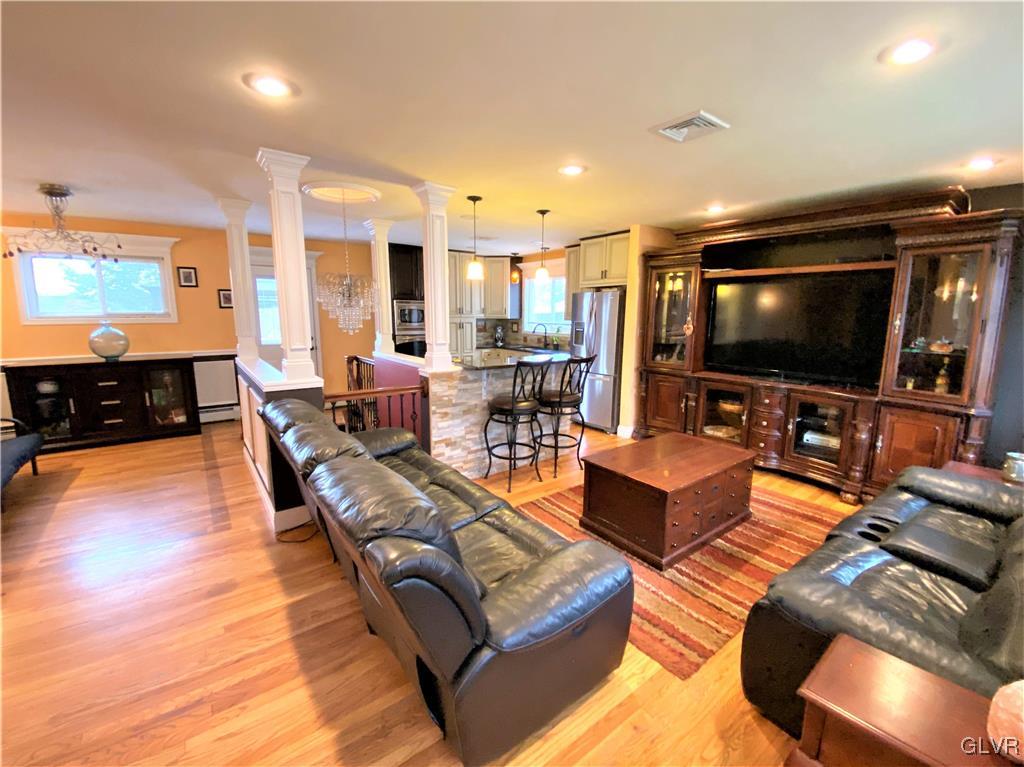 314 Willow Road Hellertown, PA 18055 - Photo 5 of 31 a living room with furniture and a flat screen tv