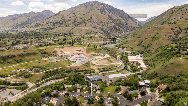 1552 Sumac Drive Logan, UT 84321 - Photo 60 of 72 Aerial perspective showcasing the surrounding mountainous terrain and a winding river