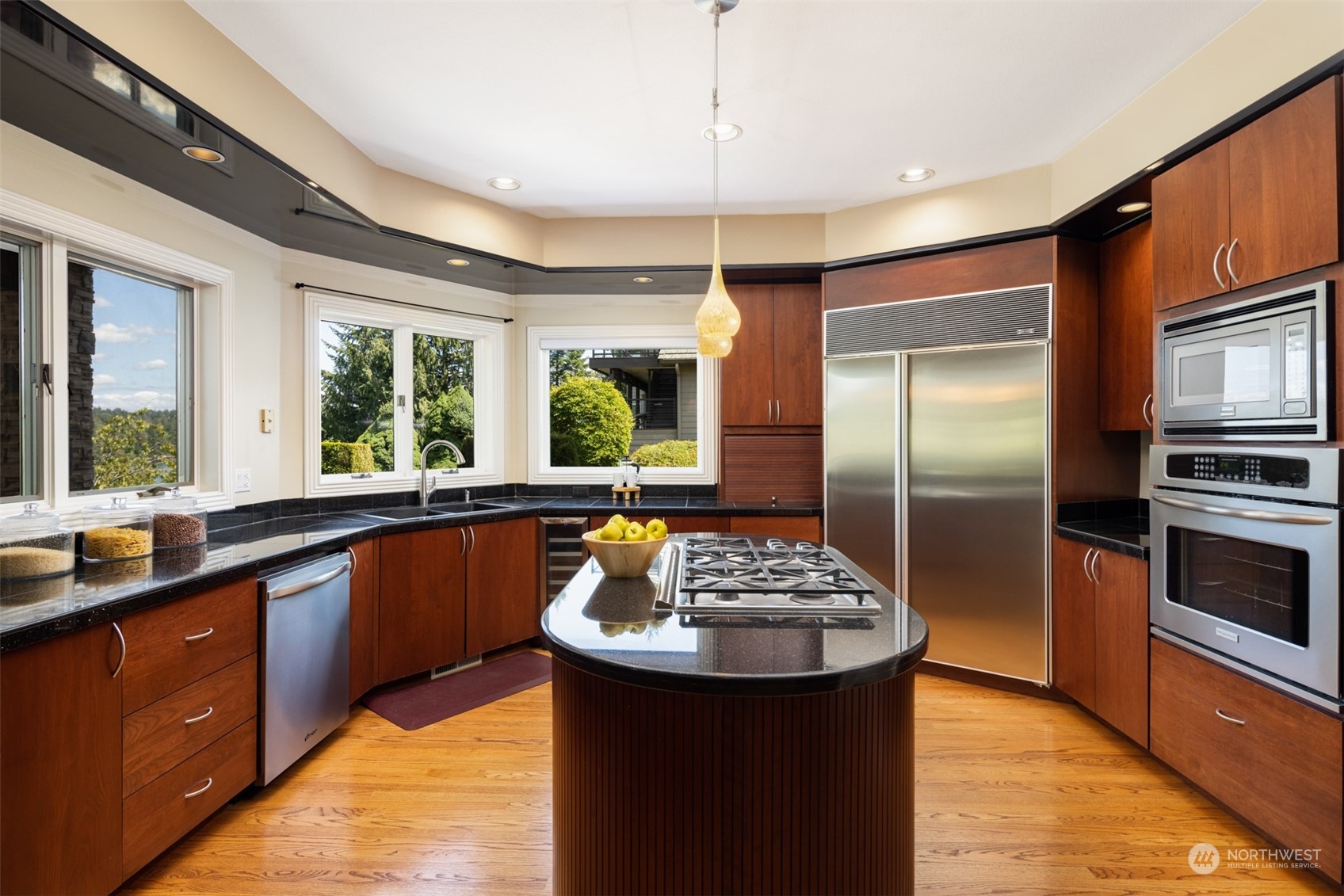 2013 Northwest Lacamas Drive Camas, WA 98607 - Photo 13 of 40 a kitchen with stainless steel appliances kitchen island granite countertop a sink stove and refrigerator