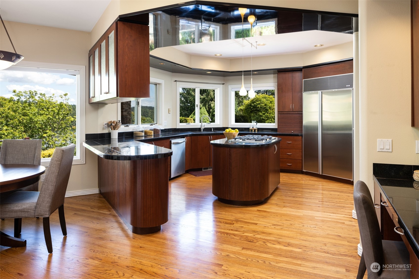 2013 Northwest Lacamas Drive Camas, WA 98607 - Photo 14 of 40 a kitchen with stainless steel appliances granite countertop a stove a sink and a refrigerator