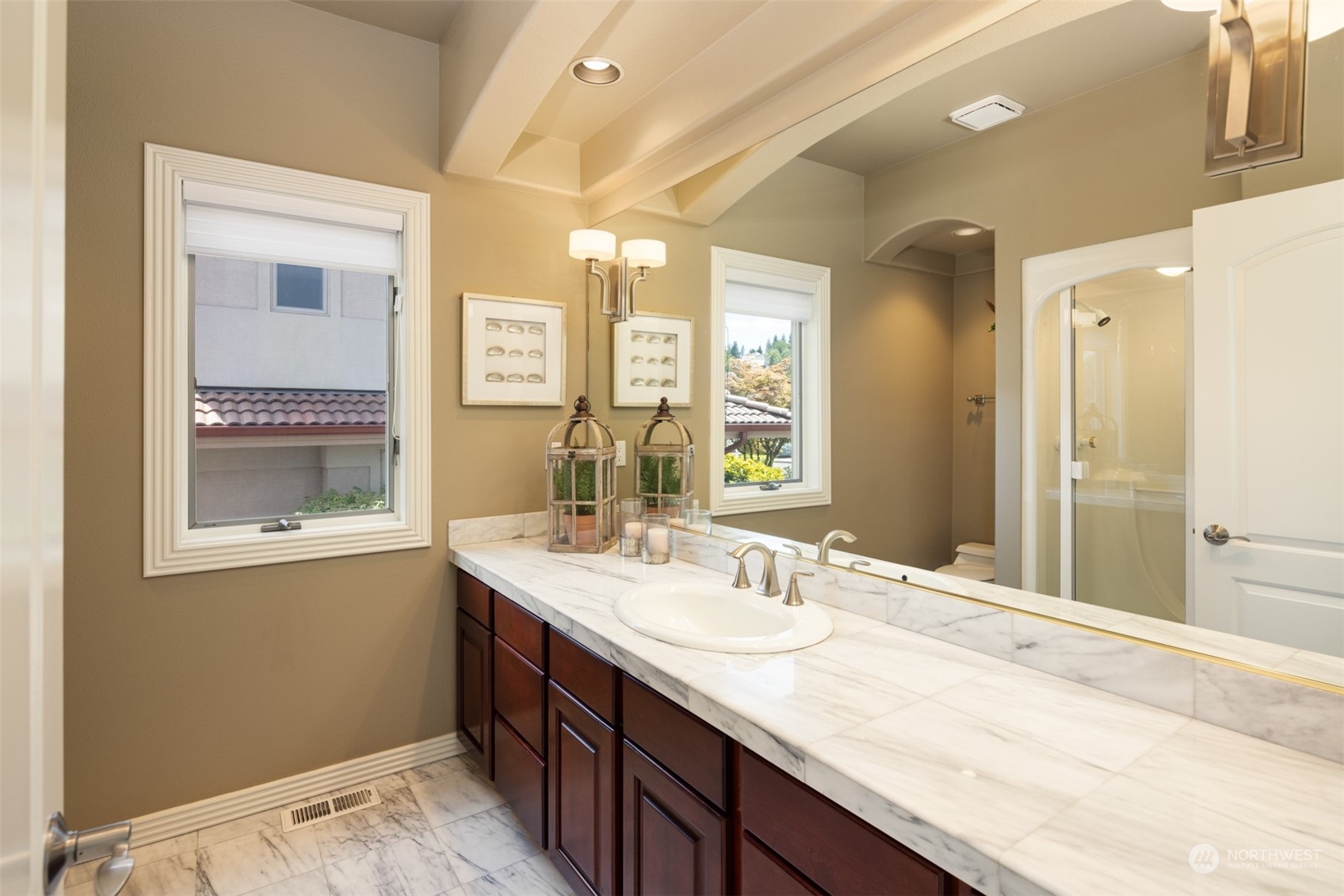2013 Northwest Lacamas Drive Camas, WA 98607 - Photo 32 of 40 a bathroom with a sink double vanity and a mirror
