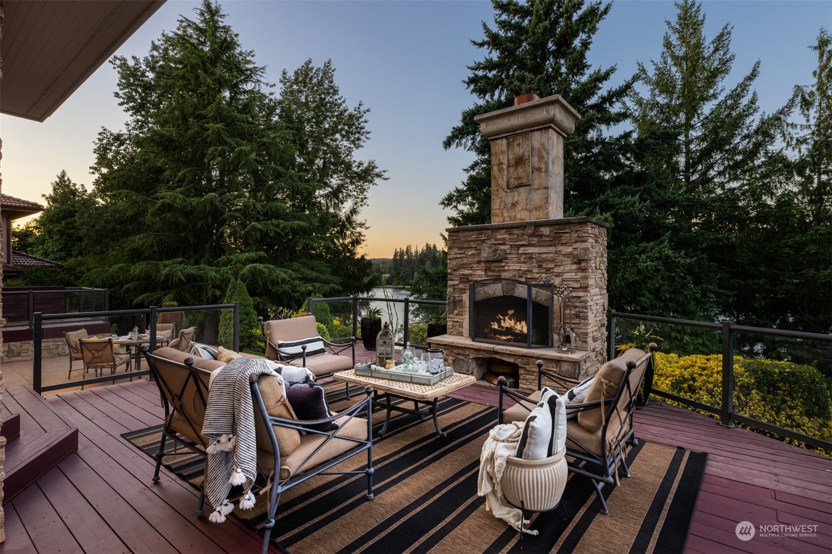 2013 Northwest Lacamas Drive Camas, WA 98607 - Photo 37 of 40 a view of a roof deck with couches and a fireplace