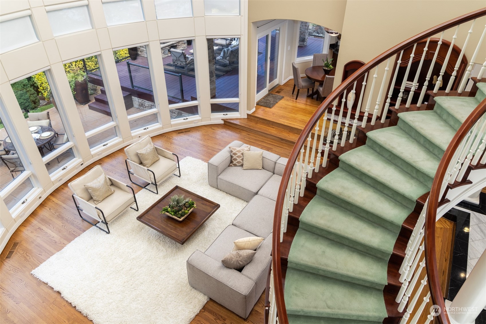 2013 Northwest Lacamas Drive Camas, WA 98607 - Photo 10 of 40 a view of staircase with lots of frames on wall and a rug