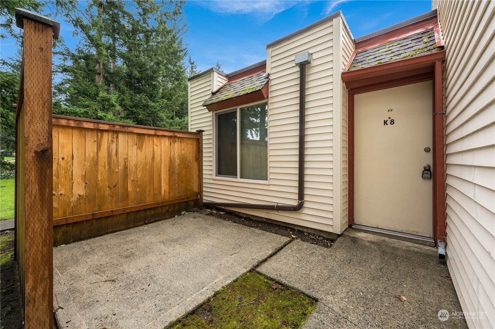 14600 Southeast 176th Street, Unit K8 Renton, WA 98058 - Photo 12 of 17 a view of a house with a yard