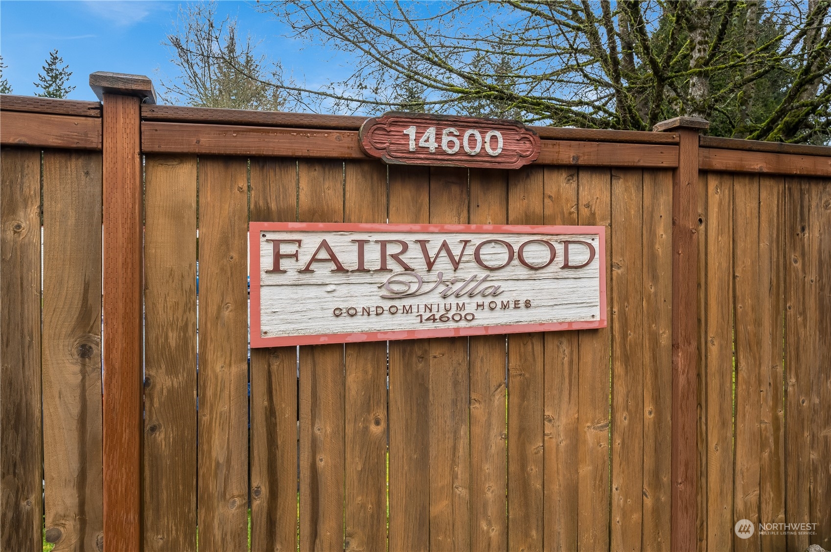 14600 Southeast 176th Street, Unit K8 Renton, WA 98058 - Photo 17 of 17 a view of a street sign on a wooden wall