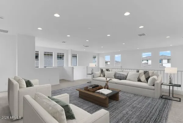 a living room with furniture and a couch