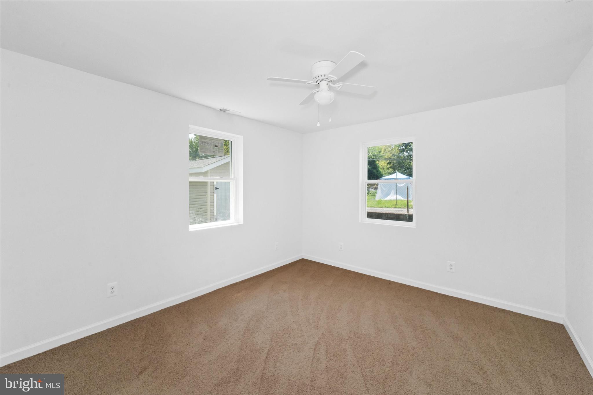 214 Keiser Place New Castle, DE 19720 - Photo 15 of 23 an empty room with windows and fan
