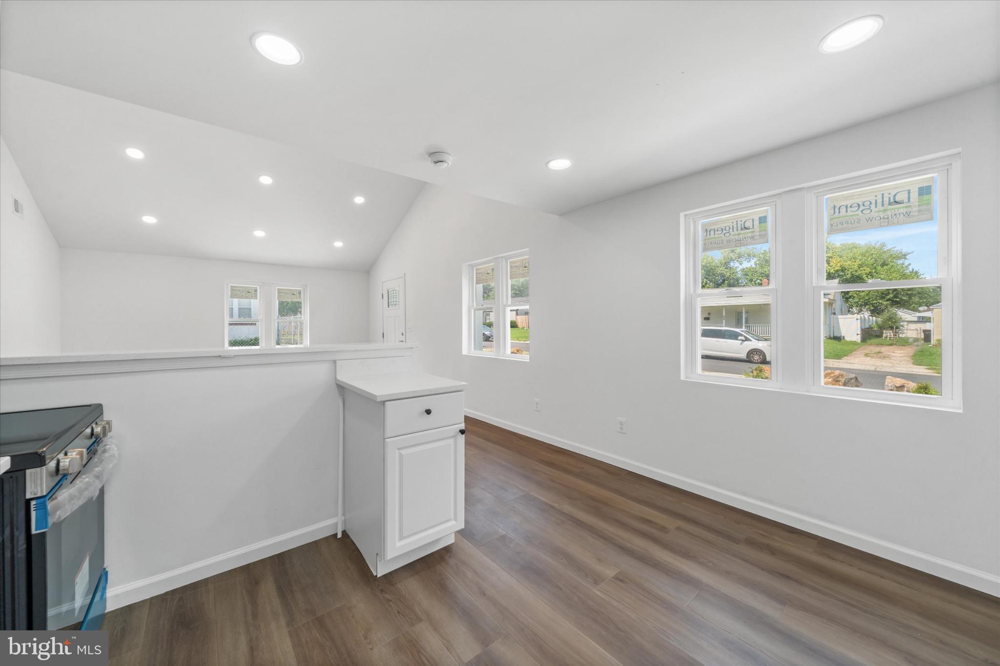 214 Keiser Place New Castle, DE 19720 - Photo 8 of 23 a view of empty room with wooden floor and window