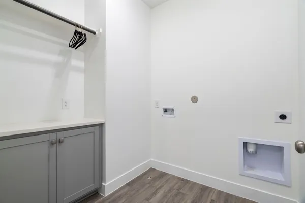 a view of a hallway with windows