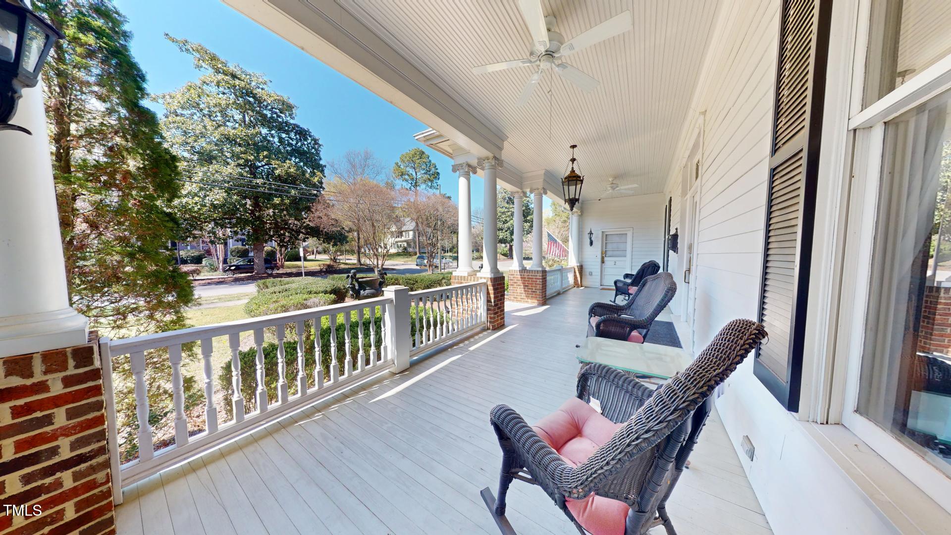 238 North Main Street Wake Forest, NC 27587 - Photo 2 of 100 a view of a chairs and table in the balcony