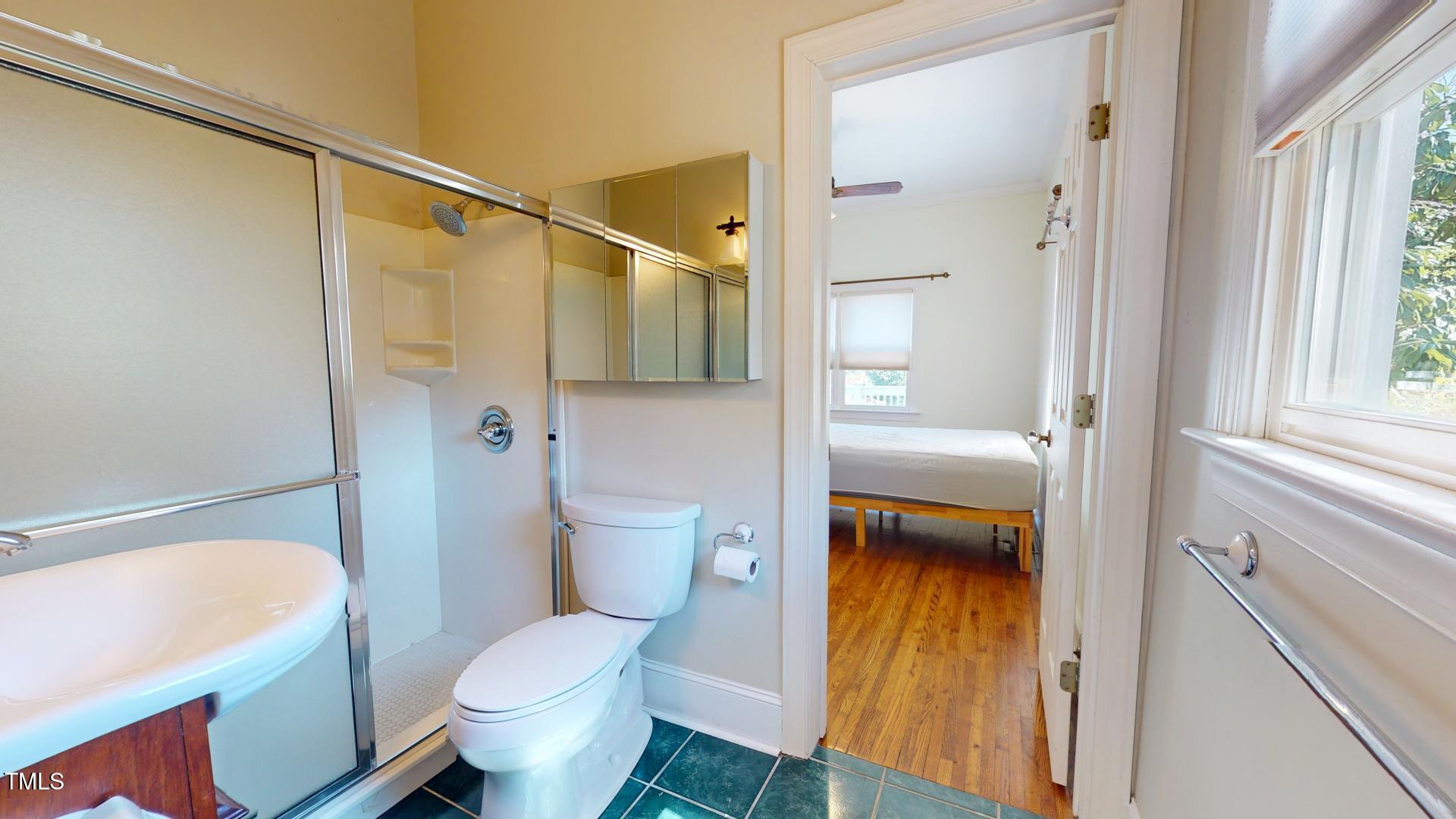 238 North Main Street Wake Forest, NC 27587 - Photo 25 of 100 a bathroom with a toilet and a shower