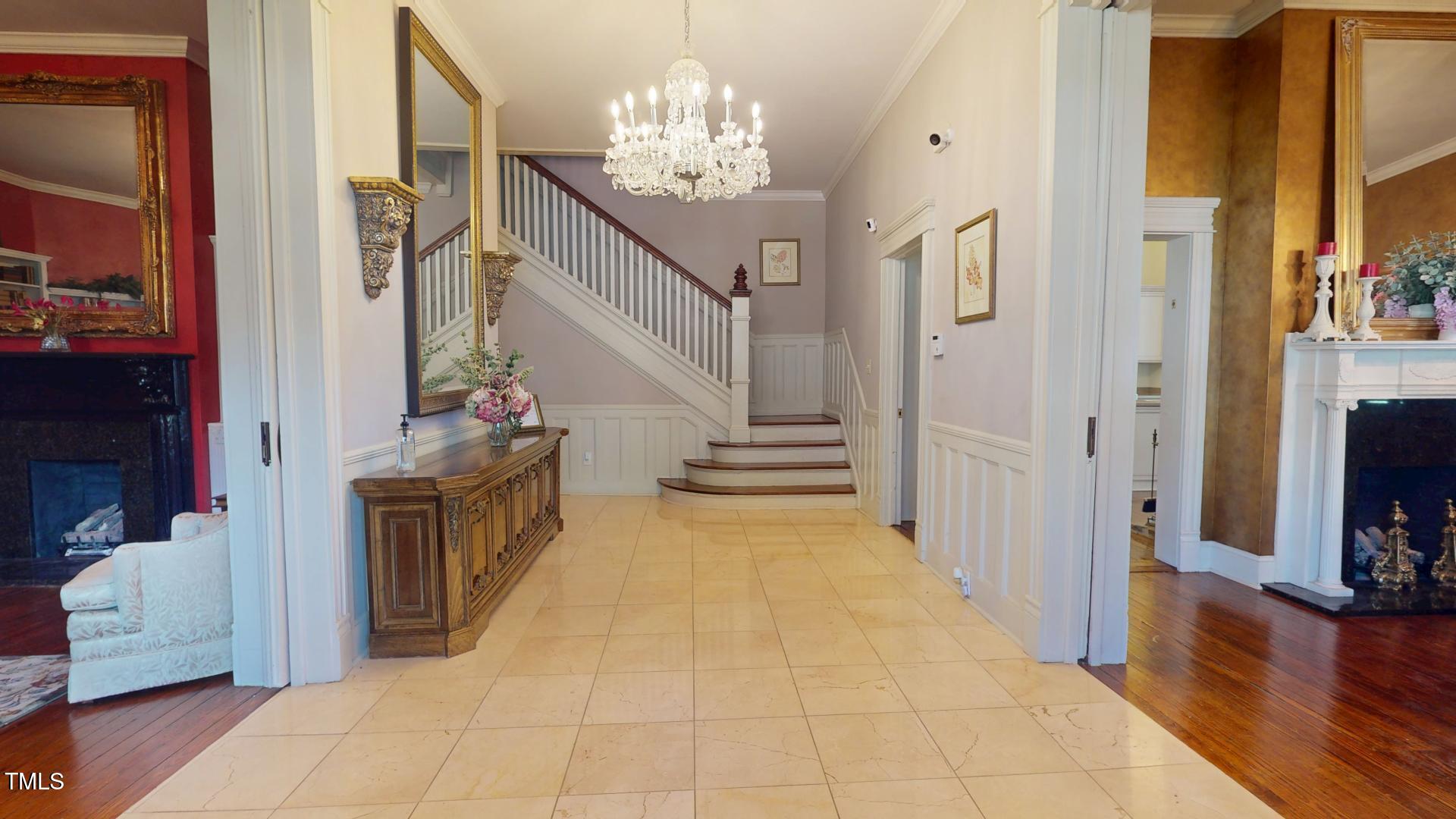 238 North Main Street Wake Forest, NC 27587 - Photo 3 of 100 a view of entryway and hall with wooden floor