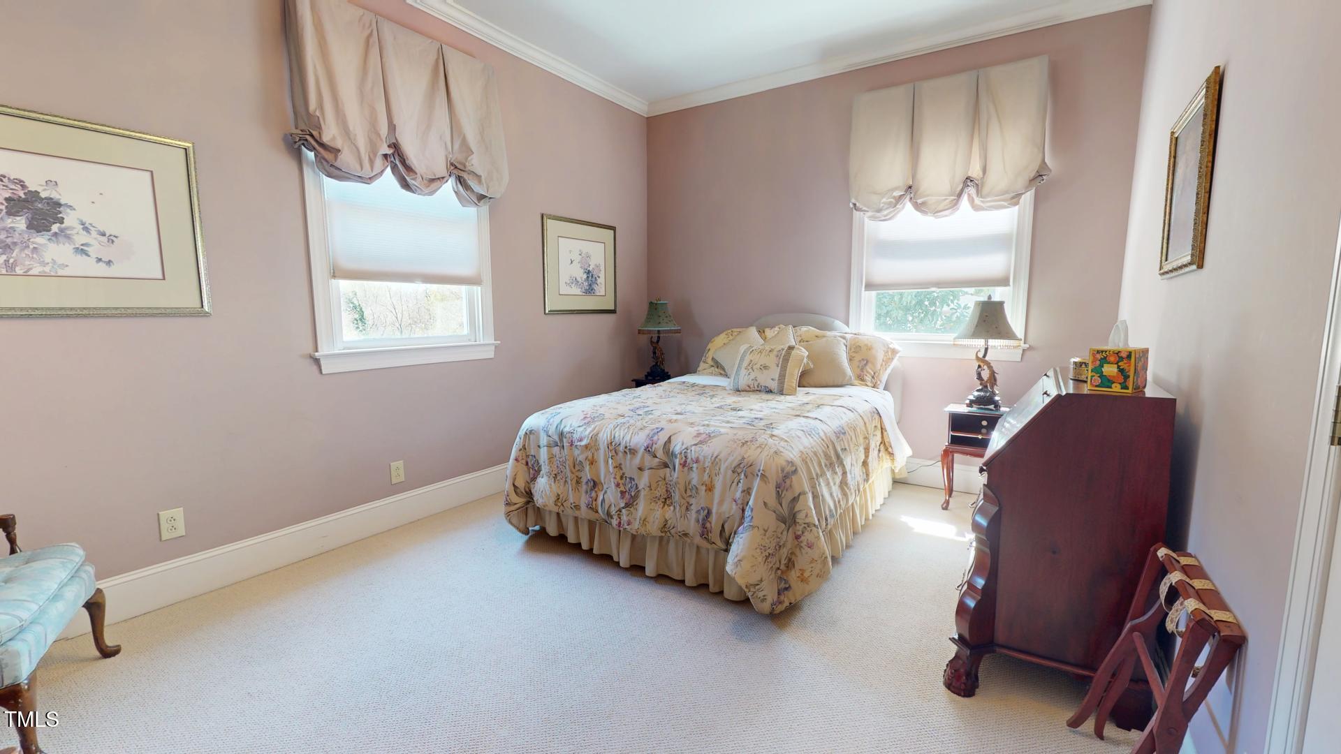 238 North Main Street Wake Forest, NC 27587 - Photo 35 of 100 a bedroom with a bed chair and window