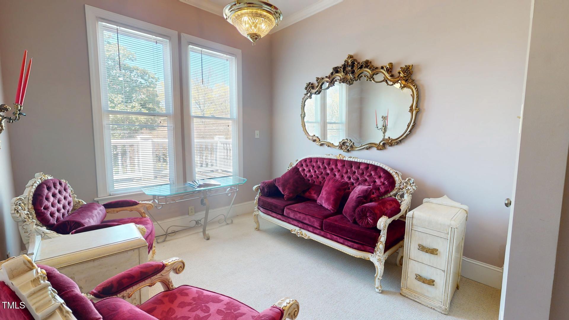 238 North Main Street Wake Forest, NC 27587 - Photo 39 of 100 a living room with furniture and a window