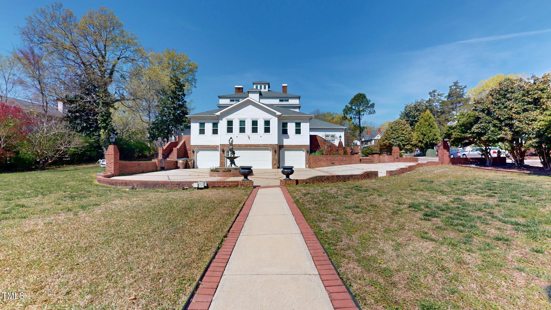 238 North Main Street Wake Forest, NC 27587 - Photo 53 of 100 a view of a house with a yard