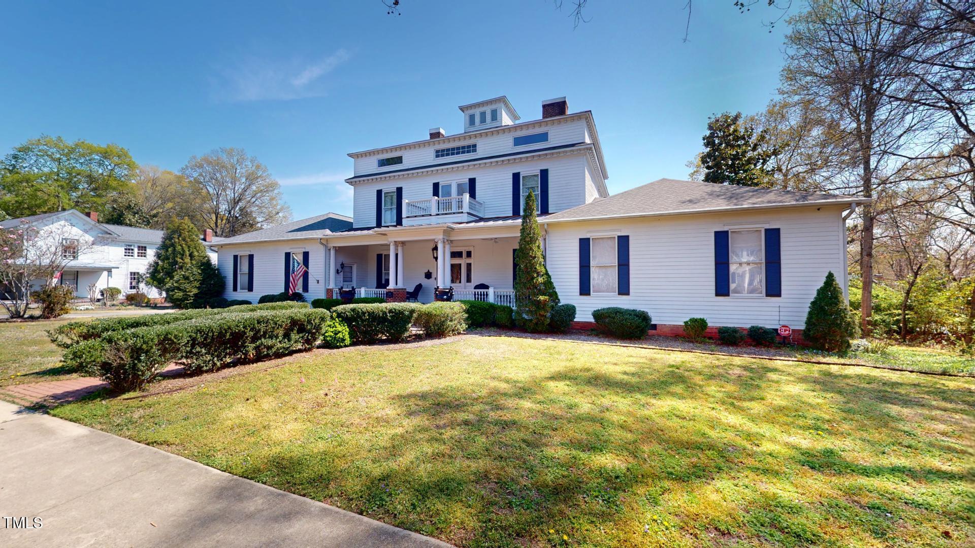 238 North Main Street Wake Forest, NC 27587 - Photo 84 of 100 a front view of a house with a yard