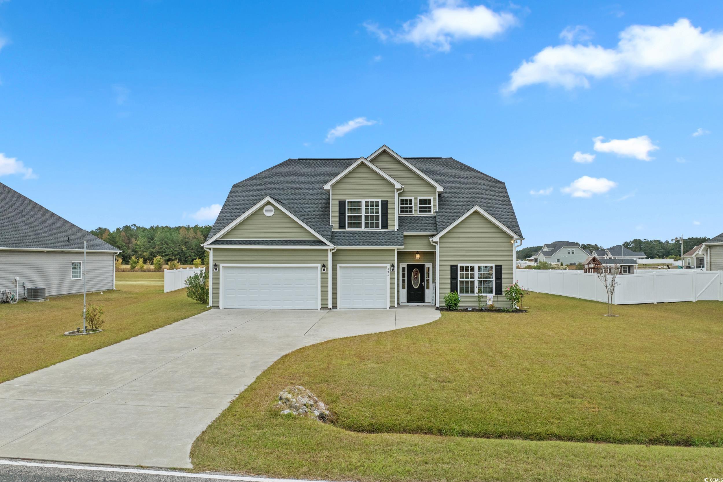 3624 Edwards Road Aynor, SC 29511 - Photo 2 of 40 Traditional-style home featuring roof with shingles and concrete driveway