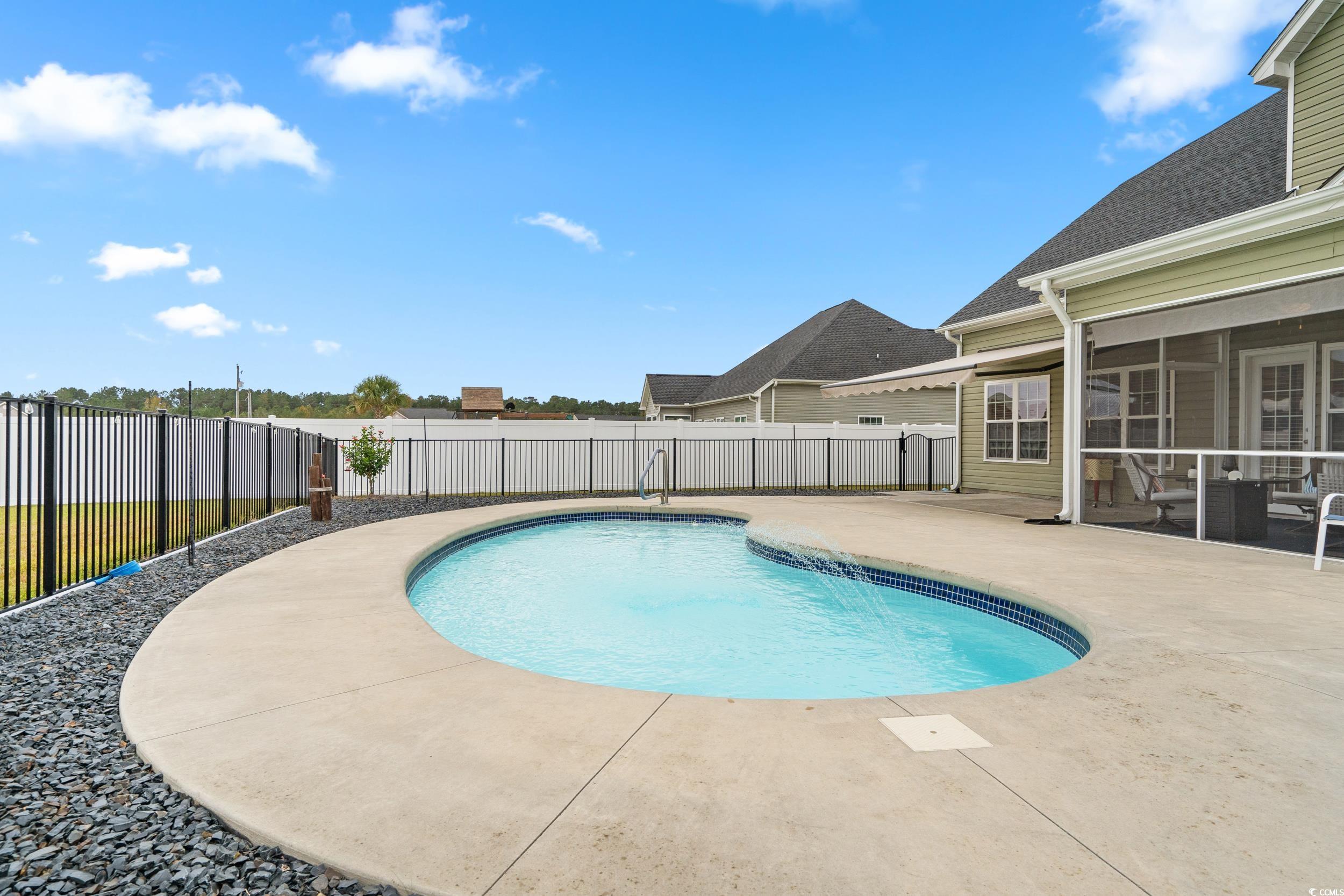3624 Edwards Road Aynor, SC 29511 - Photo 20 of 40 View of pool with a patio, a sunroom, and a fenced backyard