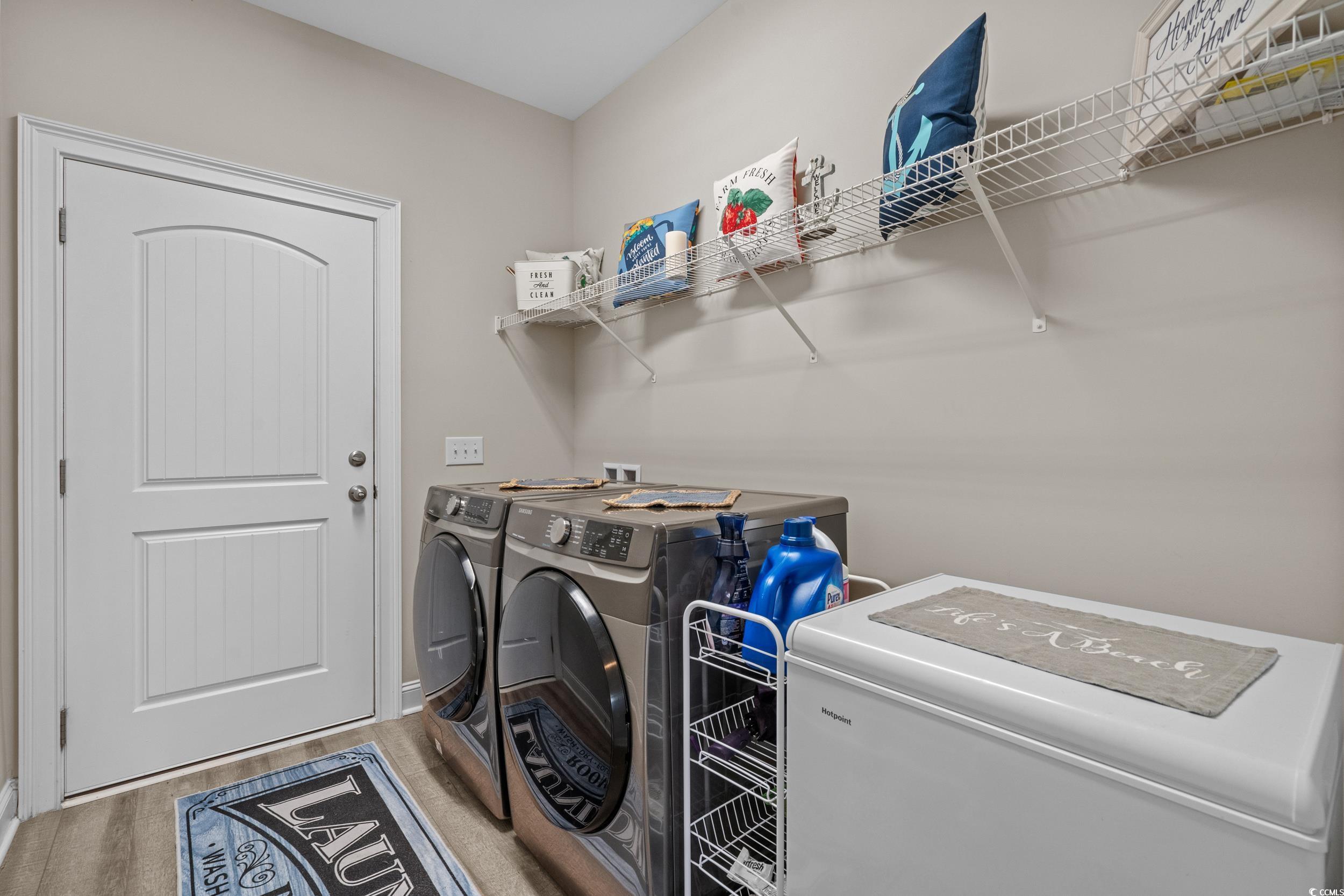 3624 Edwards Road Aynor, SC 29511 - Photo 32 of 40 Washroom featuring washing machine and dryer and wood finished floors