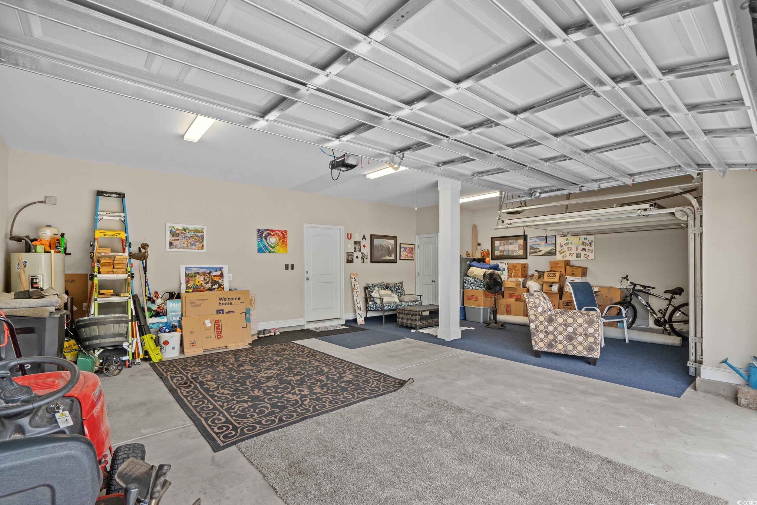 3624 Edwards Road Aynor, SC 29511 - Photo 33 of 40 Garage with electric water heater and baseboards