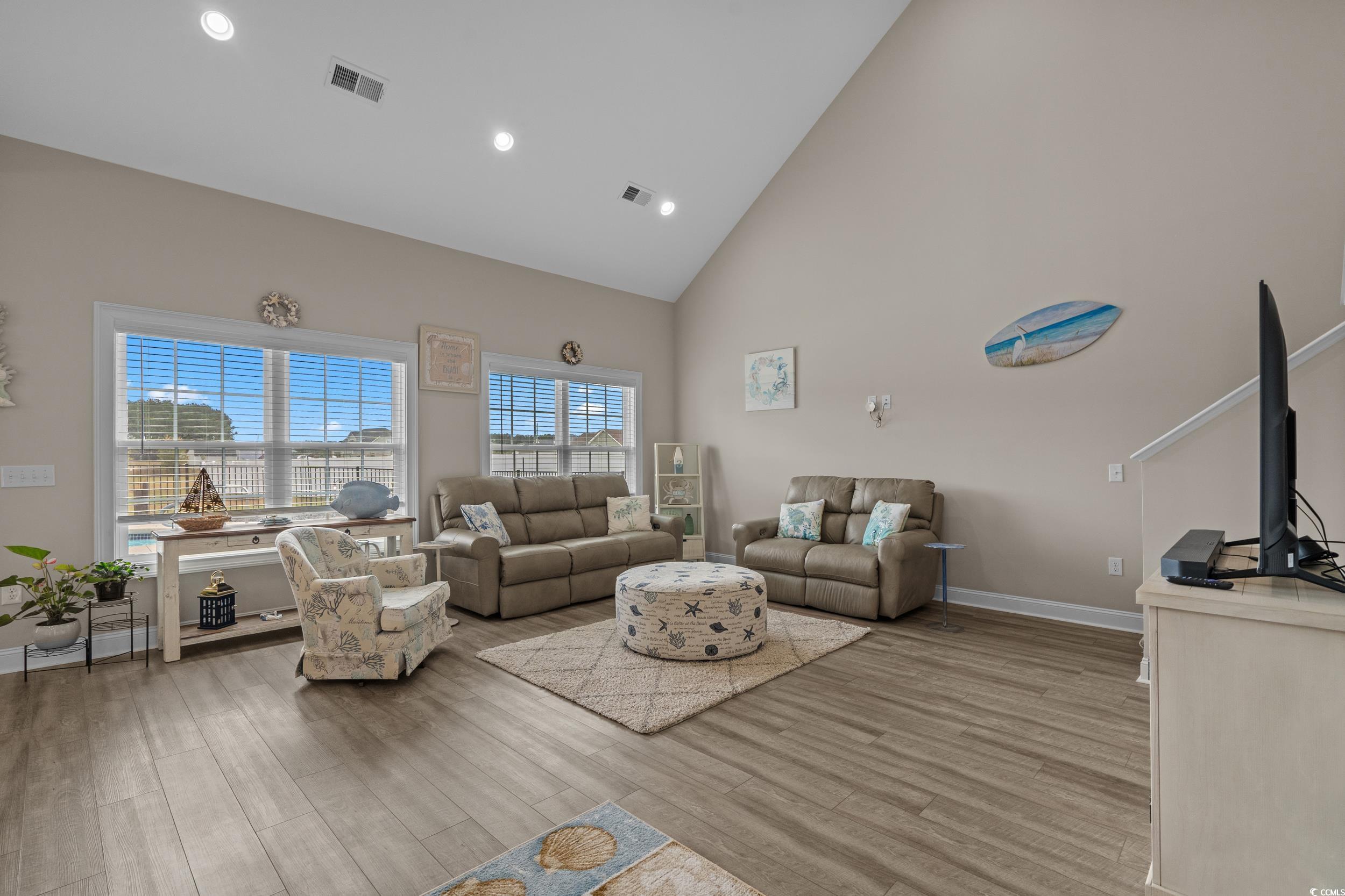 3624 Edwards Road Aynor, SC 29511 - Photo 10 of 40 Living room with high vaulted ceiling, light wood-style flooring, and recessed lighting