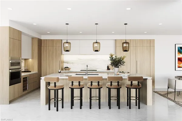a kitchen with a table and chairs in it