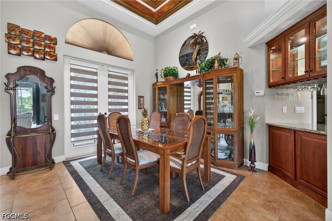 6109 Calusa Rdg Trail Bokeelia, FL 33922 - Photo 14 of 48 a dining room with furniture and window