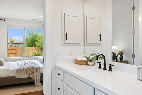 a kitchen with a sink and a window