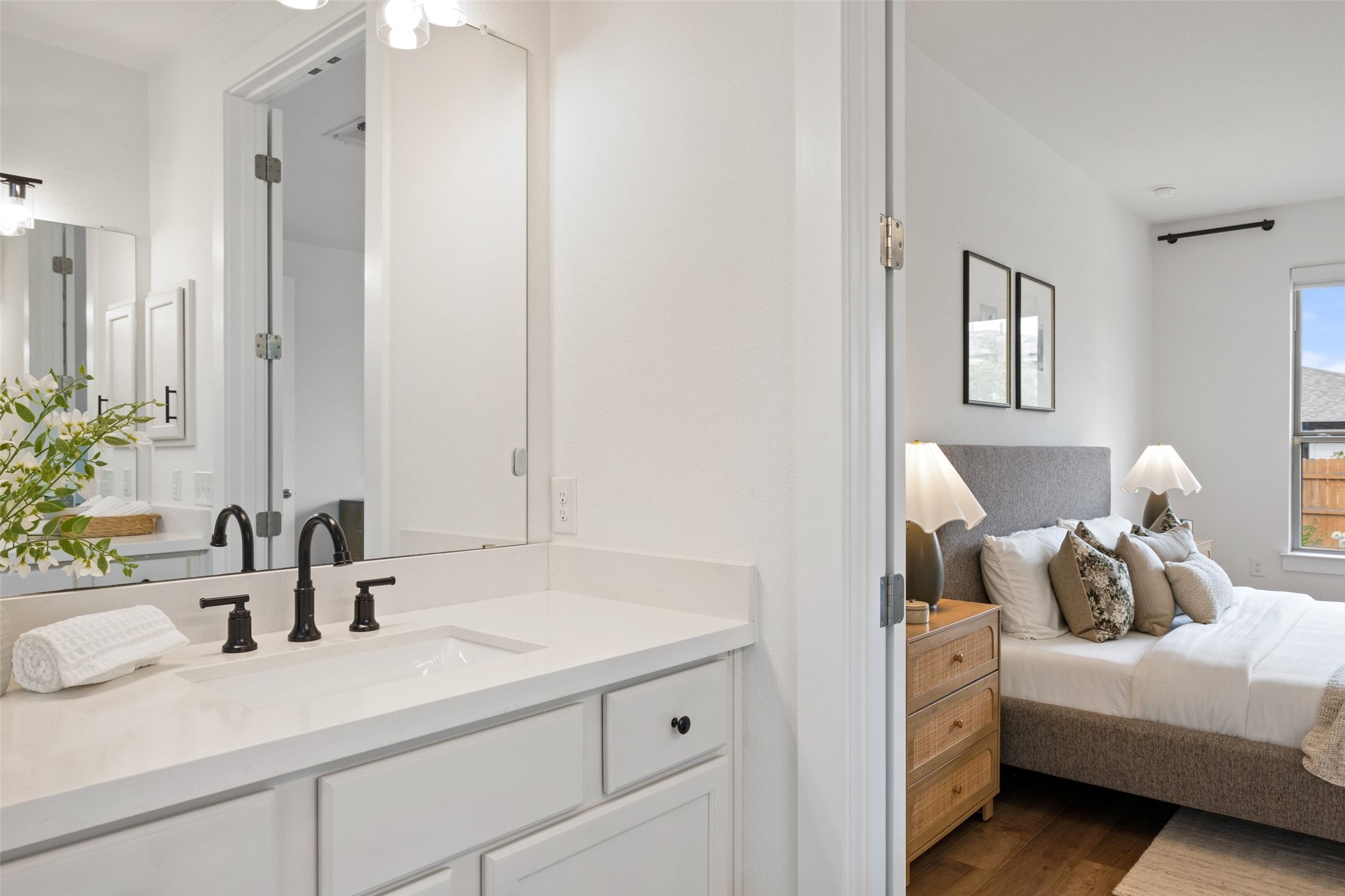 7908 Yokohama Terrace Austin, TX 78744 - Photo 24 of 40 a bathroom with a sink and a mirror