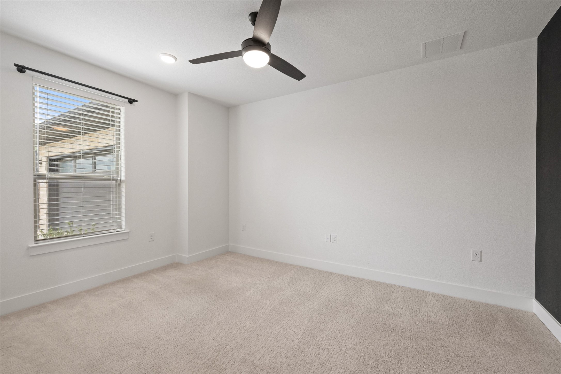 7908 Yokohama Terrace Austin, TX 78744 - Photo 26 of 40 a view of an empty room with a window