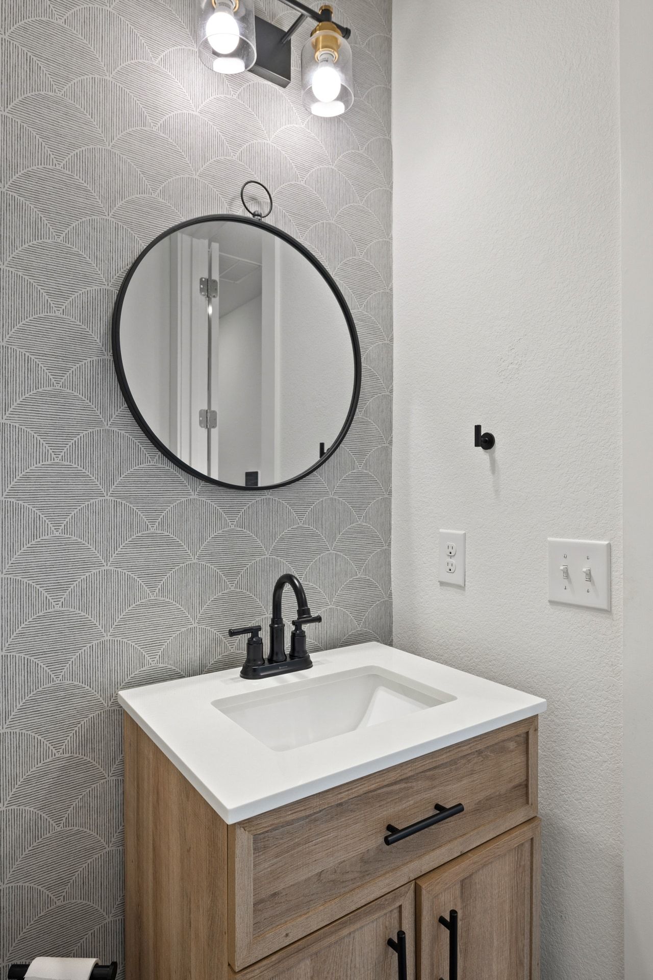 7908 Yokohama Terrace Austin, TX 78744 - Photo 34 of 40 a bathroom with a sink and mirror