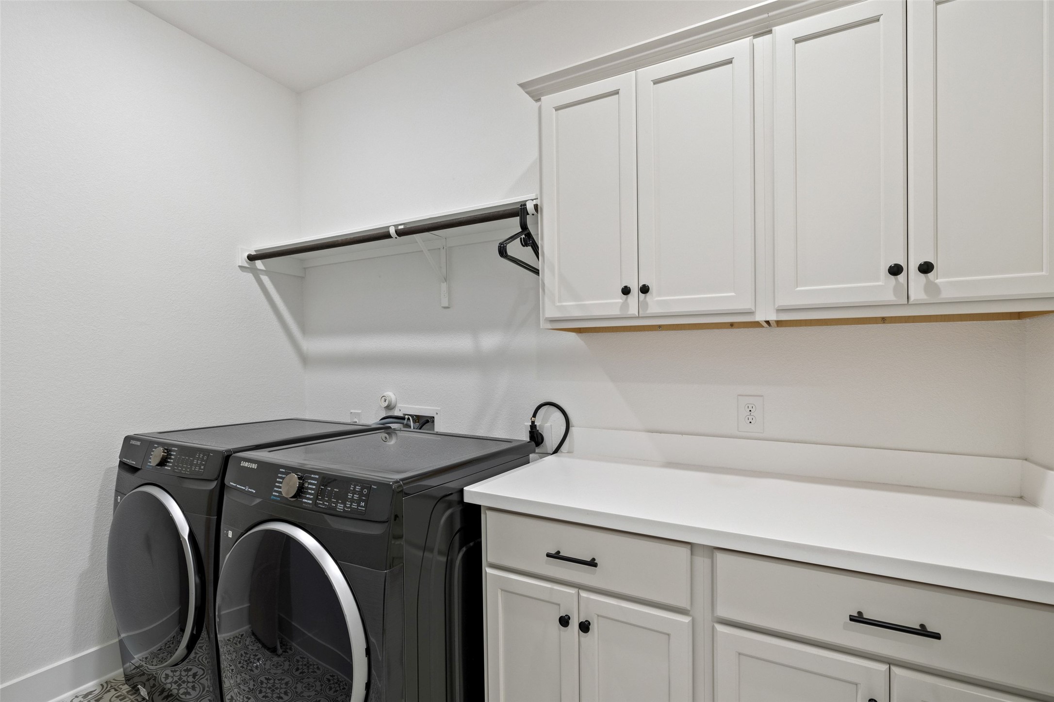 7908 Yokohama Terrace Austin, TX 78744 - Photo 35 of 40 a utility room with dryer and washer