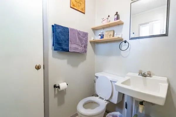 a bathroom with a sink and a toilet
