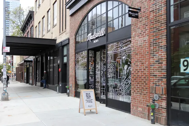 a view of shops in a street