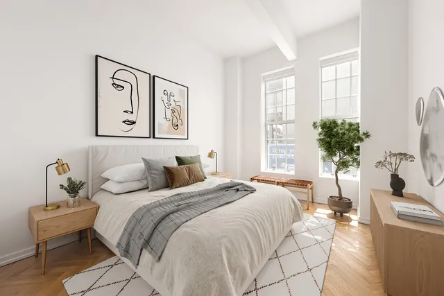a kitchen with kitchen island a sink a stove and cabinets