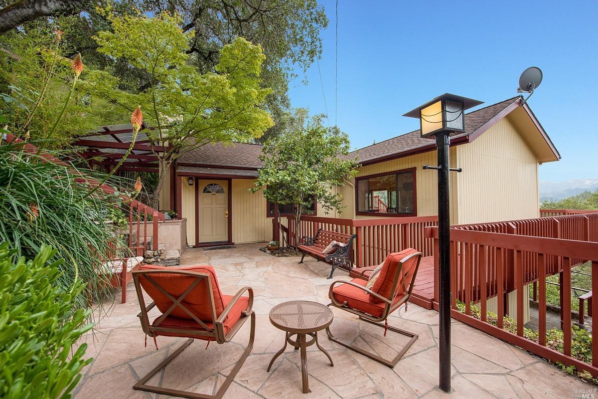 603 Sunnyside Road St. Helena, CA 94574 - Photo 1 of 1 a backyard of a house with seating space